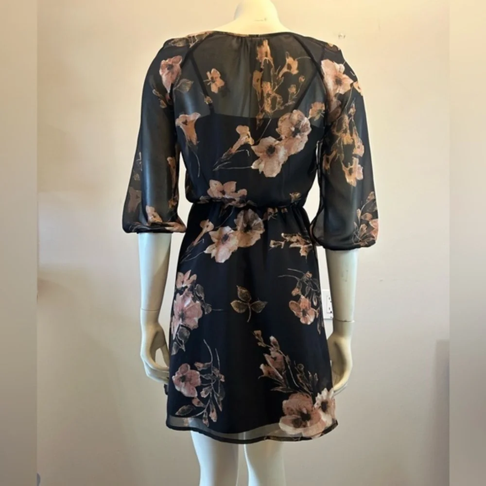 Pretty floral dress. Sheer with tank liner. Tassel details. Elastic waistband. - Picture 10 of 13